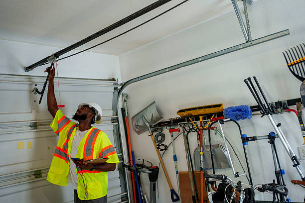 Professional Garage Door Roller Replacement technician working in Sunman, IN